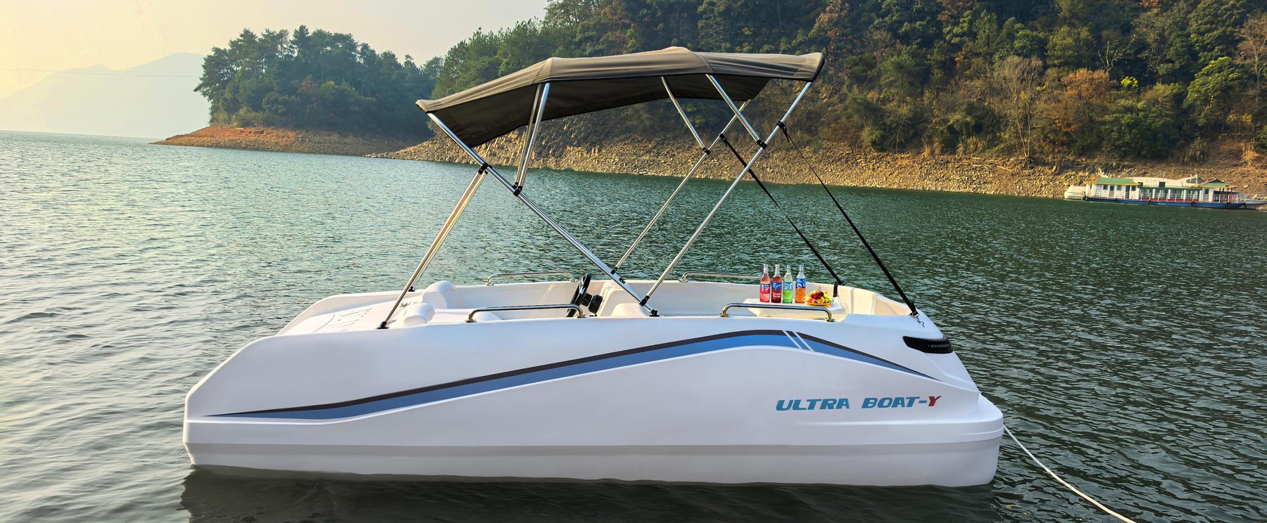 Premium leisure electric boat cruising on a lake